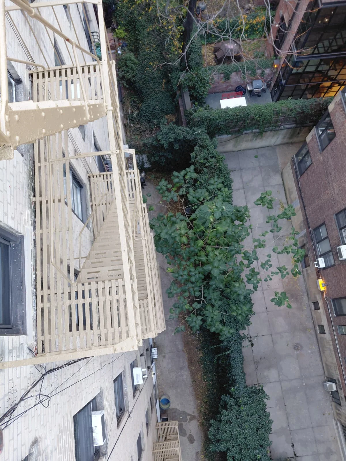 NYC building fire escape being painted for rust protection