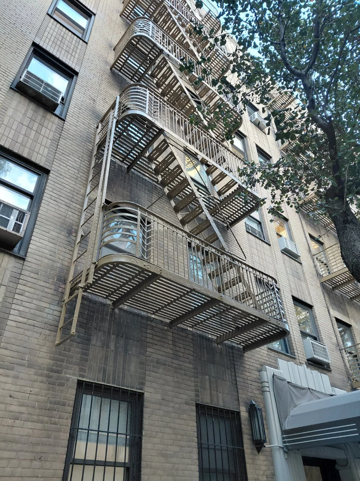 Fire escape repair services NYC fixing metal stairs and railings for safety compliance